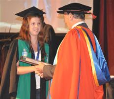 PhotoID:6824, Former Chancellor Hon Justice Stan Jones AO congratulates University Medallist and scholarship winner Erica Todd