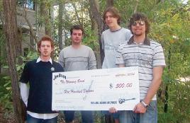 PhotoID:4330, Overall winners of the 2004 CQU Campus Band Competition was Alfanoki.  (Left to Right) Craig Gilluley (Bass), Gavin Brannigan (Drums), Michael Ryan (Guitar) and Tim Bateman (Vocals).