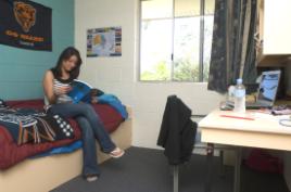 PhotoID:6382, Kelly relaxes in her room at CQUniversity's residential college.