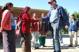 PhotoID:14200, Prof Kerry Walsh is welcomed to a village in Nepal