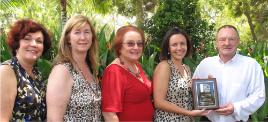 PhotoID:13625, Kathy Ramm (in red) with colleagues accepting the 'Celebrating 20 Years GlobaLinks Learning Abroad' award 