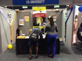 PhotoID:12808, Amanda Johnson chats with two prospective students at FOGs