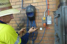 PhotoID:14447, OHS student Ben Matthews inspecting electrical tagging and testing