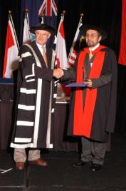 PhotoID:6696, Ergun Gide receives his award from the Vice-Chancellor