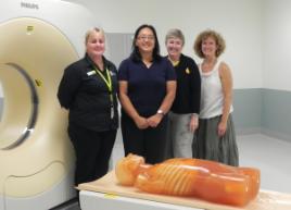 PhotoID:10837, Min Ku from the Australian Institute of Radiography is pictured inspecting the new equipment, with CQUniversity academics Kelly Spuur, Cynthia Cowling and Caroline Falconi