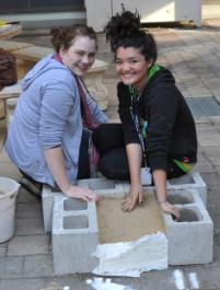 PhotoID:11076, Bronte Dwyer and Jacklyn Neyenhuis learned the engineering principles behind building a retaining wall out of sugar cubes and tissues.