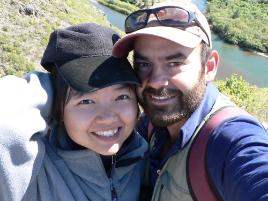 PhotoID:8760, Daniel and Xin standing above one of the rivers of the Erguna wetland