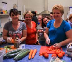 PhotoID:14045, Trixie James (second left) with volunteers who helped distribute food and necessities to Bundaberg flood victims. 