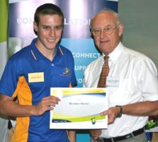 PhotoID:7072, Vice-Chancellor Professor John Rickard presents Brendon Harms with the Desmond Tabone Engineering Scholarship.