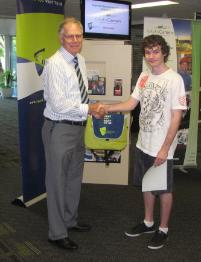 PhotoID:10181, Dr Alan McPhail, Dean of Engineering at CQUniversity congratulates Callum Stein from Toolooa SHS on his recent achievement.