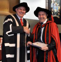 PhotoID:9623, Professor Rob Reed accepts his 2009 Vice-Chancellor's Award for Teacher of the Year from Professor Scott Bowman