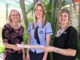 PhotoID:11638, Sally is congratulated by Rockhampton High teacher Trudy Crow (right) and former RHS student Anna Farmer, who is now a legal academic