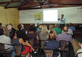 PhotoID:13022, Peter Reaburn addresses the audience in Mackay