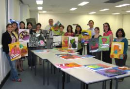 PhotoID:4192, CQU Melbourne staff and students proudly displaying their work.