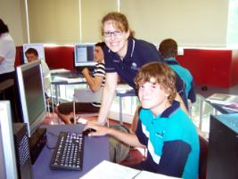 PhotoID:4415, Bradley Beare, from Tannum Sands State High School, gets some advice from Australian Technical College - Gladstone Region business trainer and course developer Carmen Barton while studying for his Certificate II in Business at CQU Gladstone's Cyril Golding Library. 