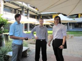 PhotoID:13411, Cameron Gaffel, Luke Miller and Adam Hargreaves chat before presenting their final projects