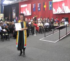 PhotoID:13210, Natasha Davui proudy wore a special sash acknowledging her Indigenous background