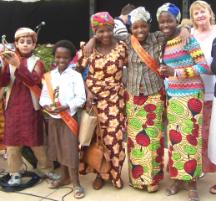 PhotoID:5558, Glenys Kirkwood on right rear with winners of the Junior Ambassador awards L to r Asadel Qureshi (7-9 years), Naomi Matabashi (10-12 years), proud mother Mrs Matabashi, Doricas Matabashi and Esther Matabashi (tied 13-18 years)