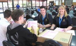 PhotoID:11225, College residents Aimee Wilson and Phillip Rickert help distribute Census forms