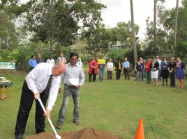 PhotoID:13252, CQUniversity Multi-Faith Chaplain Shaji Joseph watches on as Vice-Chancellor Professor Scott Bowman turns the sod, before construction gets under way on a new Multi-Faith Centre on Rockhampton Campus