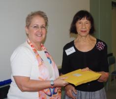 PhotoID:12387, A presentation was made to Dr Judith Applegarth (left), recognising completion of her PhD and her status as an invited speaker and award nominee for a major conference in Turkey