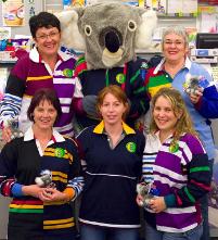 PhotoID:4657, Shirley is in disguise for help raise funds for her beloved koalas. CQU Bookshop staff show off the Canterbury Uglies which are now on sale.