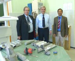 PhotoID:14577, Brendan Donnelly (left) and Assoc Prof Ashwath Nanjappa (right) from CQUniversity with Professor Ilyinov Mikhail, Head of the Geotechniques laboratory at the Mining University