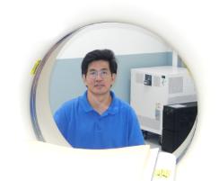PhotoID:12144, Dr Victor Zhou with a CT Scanner at CQUniversity Mackay