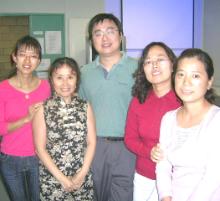 PhotoID:5607, CQU lecturer Qing Huang with the visitors