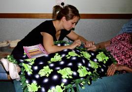 PhotoID:14605, Jessica Morton provides a nail polish to a nursing home resident