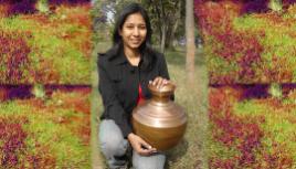 PhotoID:12882, Dr Riti Sharan with one of the copper water jugs