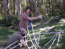 PhotoID:7411, Kris Martin with the framework for his woven boat