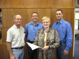 PhotoID:8035, Associate Professor for Mining Dr Col Greensill, ACA Regional Manager for Human Resources Paul White, one of the pioneering Mining Associate graduates Mitch Cameron (from Callide Mine) and Deputy Vice-Chancellor Professor Angela Delves at the MOU signing ceremony