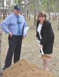 PhotoID:11495, Professor Jennelle Kyd and Professor Graham Pegg perform the ceremonial sod-turning