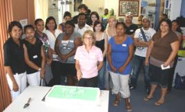 PhotoID:6888, Kayleen Busk poses with the TEP cake