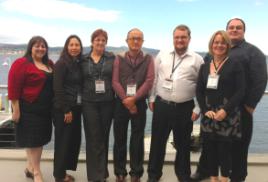 PhotoID:11723, L-R Tania, Molly, Robyn, Stephen, Michael, Kym (from AustLearn Rocky) and Jeremy flying the flag for CQUni in Hobart