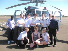 PhotoID:11185, Our Bundaberg-based Aviation students took the opportunity to inspect a military Seahawk helicopter visiting their local airport recently. The were guided by Aviation senior lecturer Ron Bishop