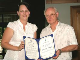 PhotoID:5255, Vice-Chancellor Professor John Rickard presents Jennifer Frazer with her Excel Award.