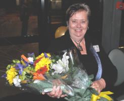 PhotoID:7358, Long-serving College manager Robyn James received flowers