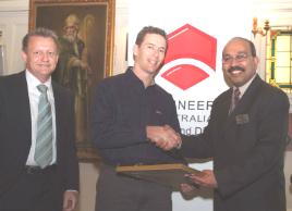 PhotoID:6168, Glen Bearham (centre) with Outgoing Qld RTSA Chapter Chair Mark Wishart and RTSA Executive Chairman Ravi Ravitharan