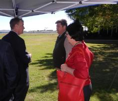 PhotoID:12717, Senator John Hogg speaks to CQUniversity Mackay head of campus Professor Pierre Viljoen and Emerald campus' Cr Gai Sypher. 