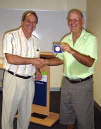 PhotoID:6705, Professor Kevin Tickle presents John Dekkers with his 25 year service medal.