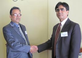 PhotoID:11395, Professor Masud Khan (right) congratulates Dr Nur Hassan on his PhD