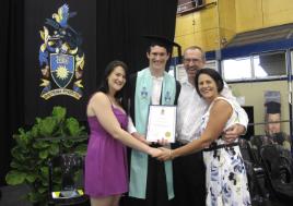 PhotoID:11961, Jarrod Spear celebrates graduation with sister Jody, father Brad and mother Yvonne