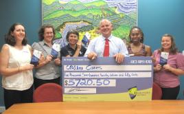 PhotoID:11775, Vice-Chancellor Professor Scott Bowman is flanked by CQUni Cares advocates L-R Tamsen Clifford-Banks, Anthea Cuddihy, Suzi Blair, Reegan Bickey and Aimee Bartlett