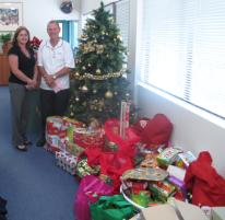 PhotoID:10217, Mr Ian Jones from The Salvation Army with CQUni's Carol Burnett.