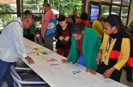 PhotoID:14824, Participants were encouraged to write ideas on a long table