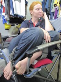 PhotoID:10350, Volunteer Jessica takes a brief break from the flood of recovery work