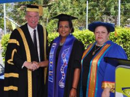 PhotoID:13209, Melinda Mann is congratulated by Deputy Chancellor Charles Ware and Pro Vice-Chancellor (Indigenous Engagement) Professor Bronwyn Fredericks