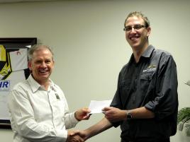 PhotoID:10038, Mike Browne from Brown and Bird (left) congratulates Scott Jamieson on his bursary, on behalf of the Mackay Financial Planning Career Development Group